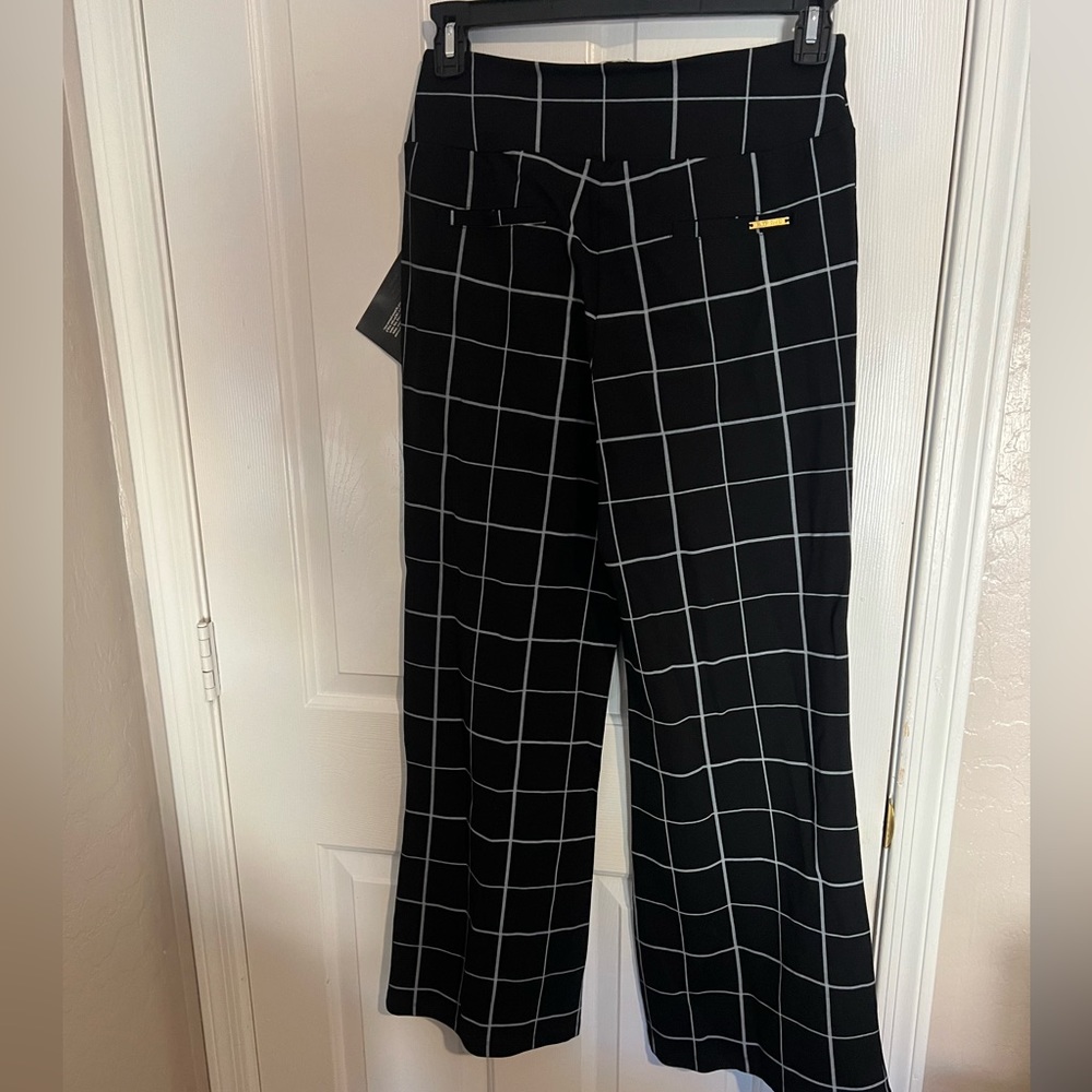 IMAN Ladies plaid pants with tags. Medium Average. Size 9/10.